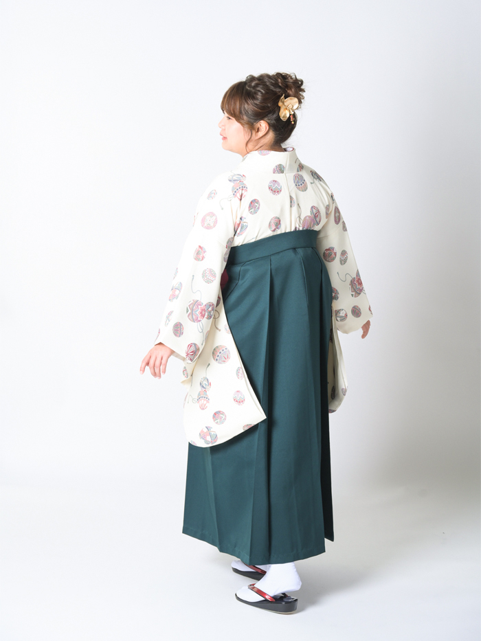 後ろ姿の女性教員