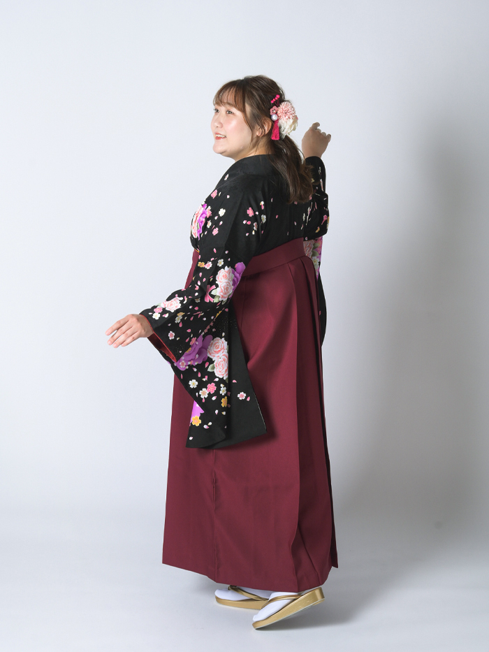 後ろ姿の女性教員